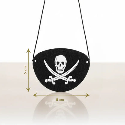 Cache-œil pirate noir avec tête de mort, dimensions indiquées sur fond blanc de 8 x 6 cm.