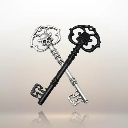 Deux variantes argent et noir de la clé du tombeau interdit.