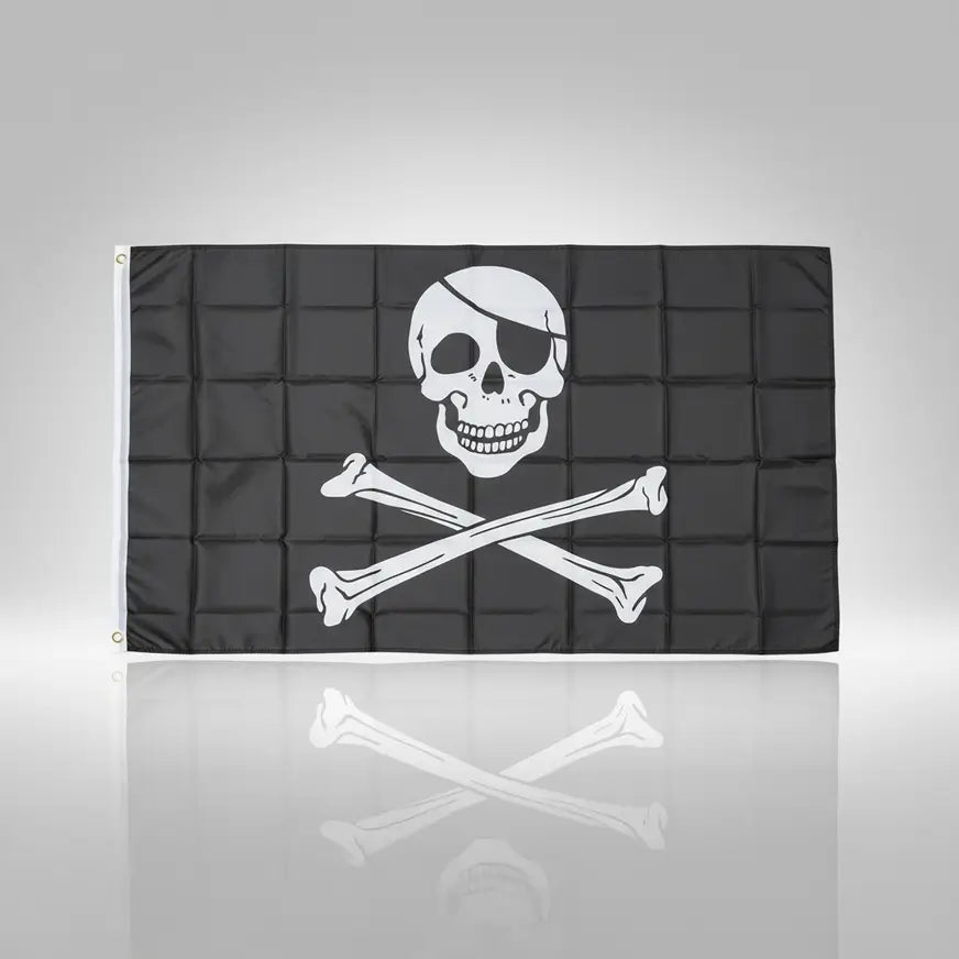 Drapeau pirate noir avec crâne blanc et os croisés.