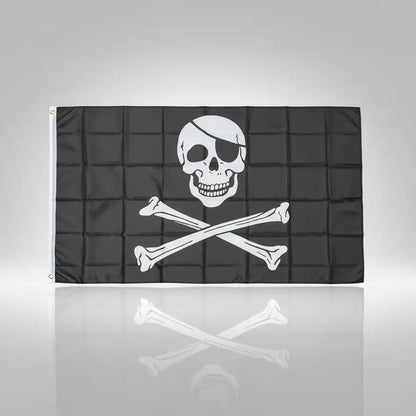 Drapeau pirate noir avec crâne blanc et os croisés.
