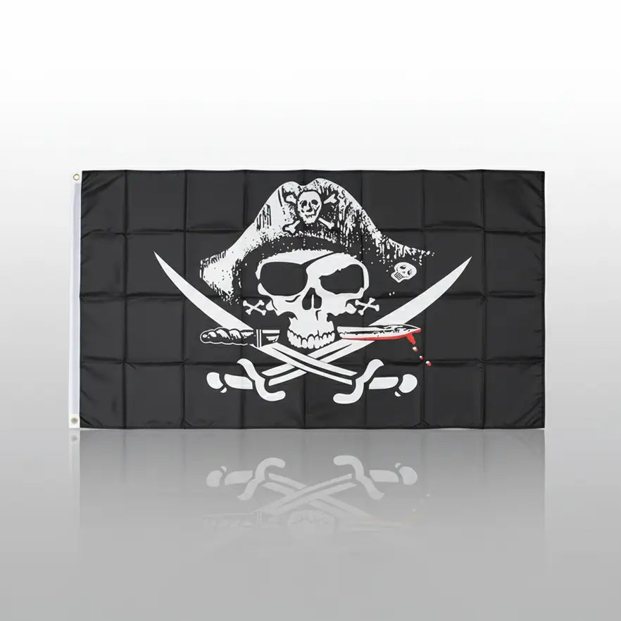 Drapeau pirate avec crâne coiffé d’un chapeau et sabres croisés.