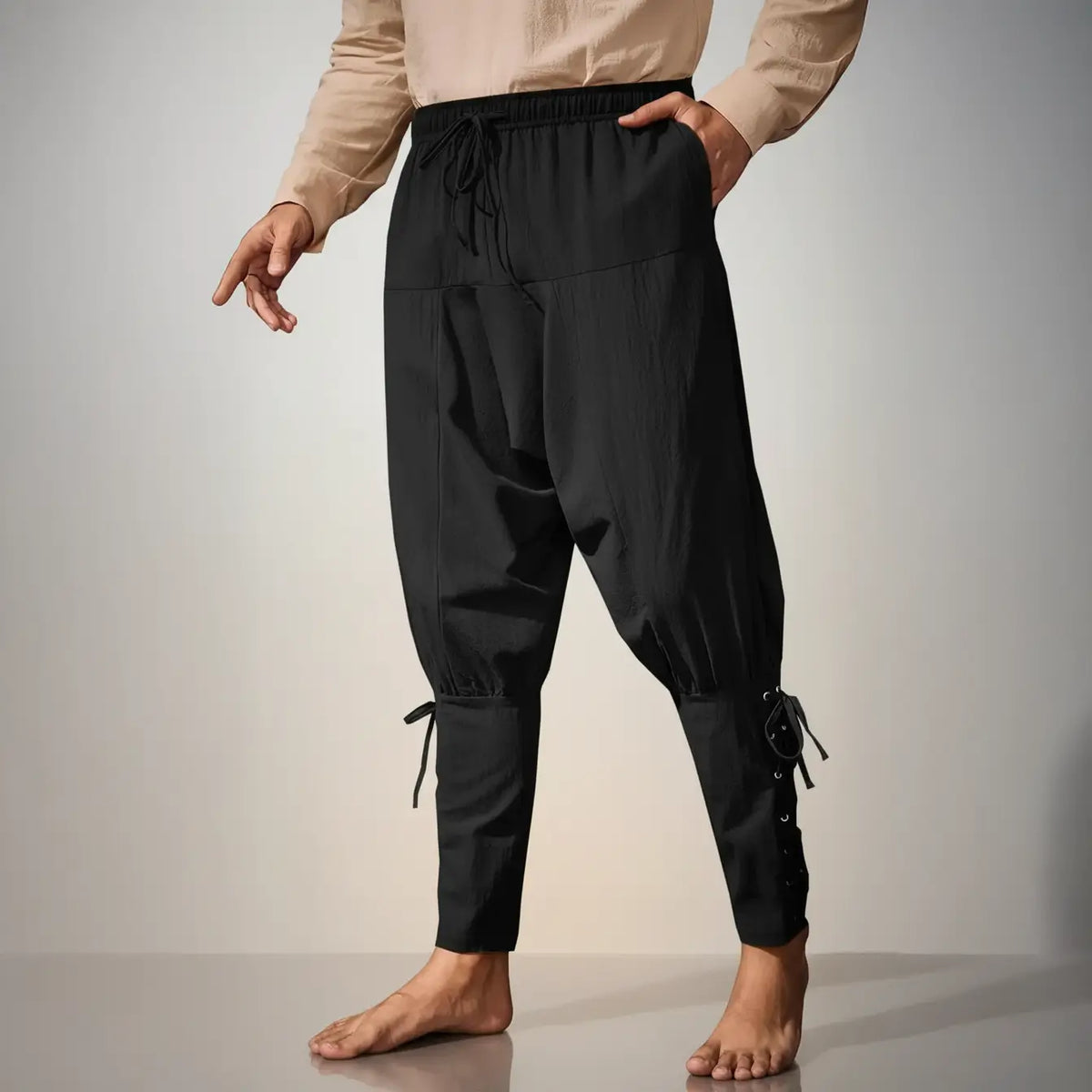 Pantalon du corsaire des mers noir, style pirate médiéval avec liens ajustables.