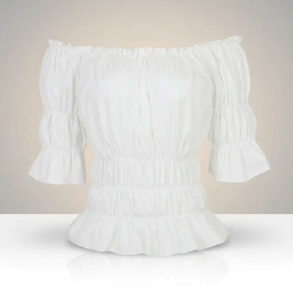 Chemisier blanc de la tenue de la navigatrice pirate présenté sur fond blanc.