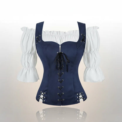 Ensemble corset bleu avec chemisier blanc de la tenue de la navigatrice pirate sur fond blanc vue de face.
